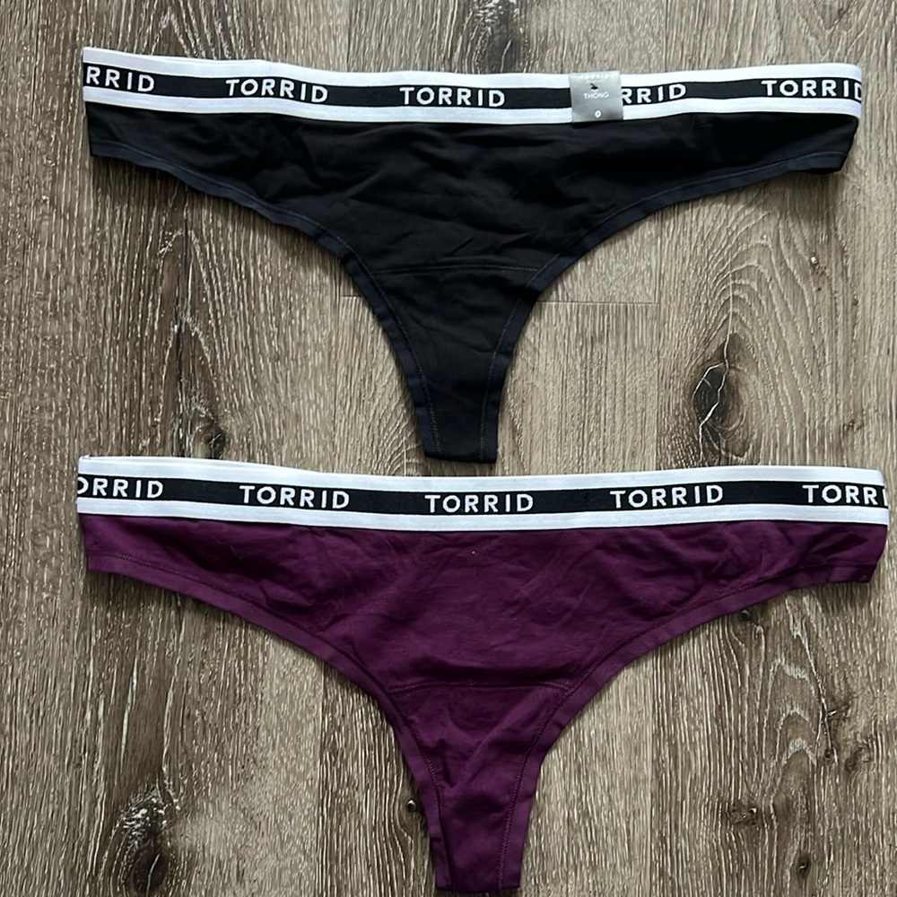 Two torrid thongs. New. Size 0
